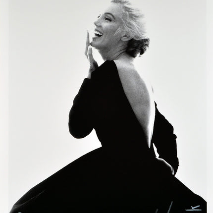 The Last Sitting - Marilyn laughing in black Dior dress, 1962