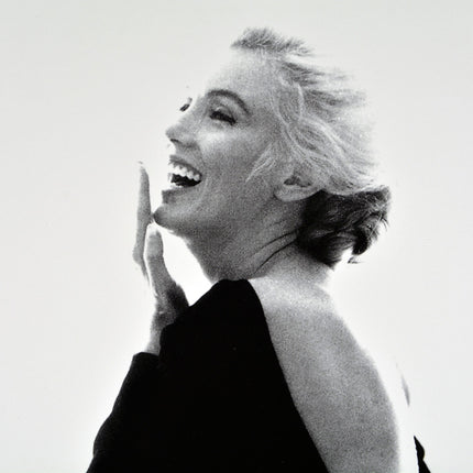 The Last Sitting - Marilyn laughing in black Dior dress, 1962